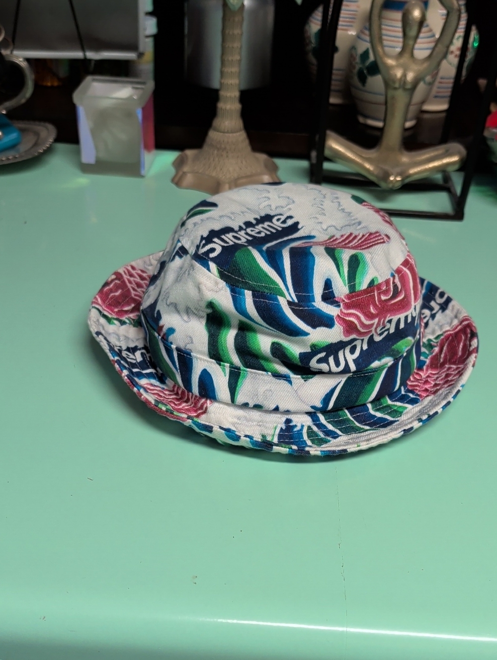 Supreme White Floral Logo Bucket Hat with Blue, Green & Pink Print